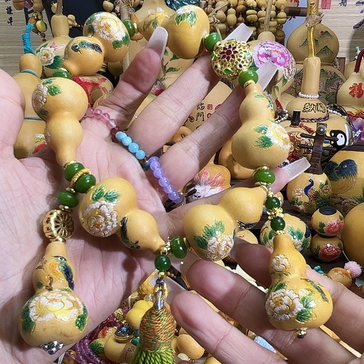 把***开木质类纯手工磨刻葫芦
