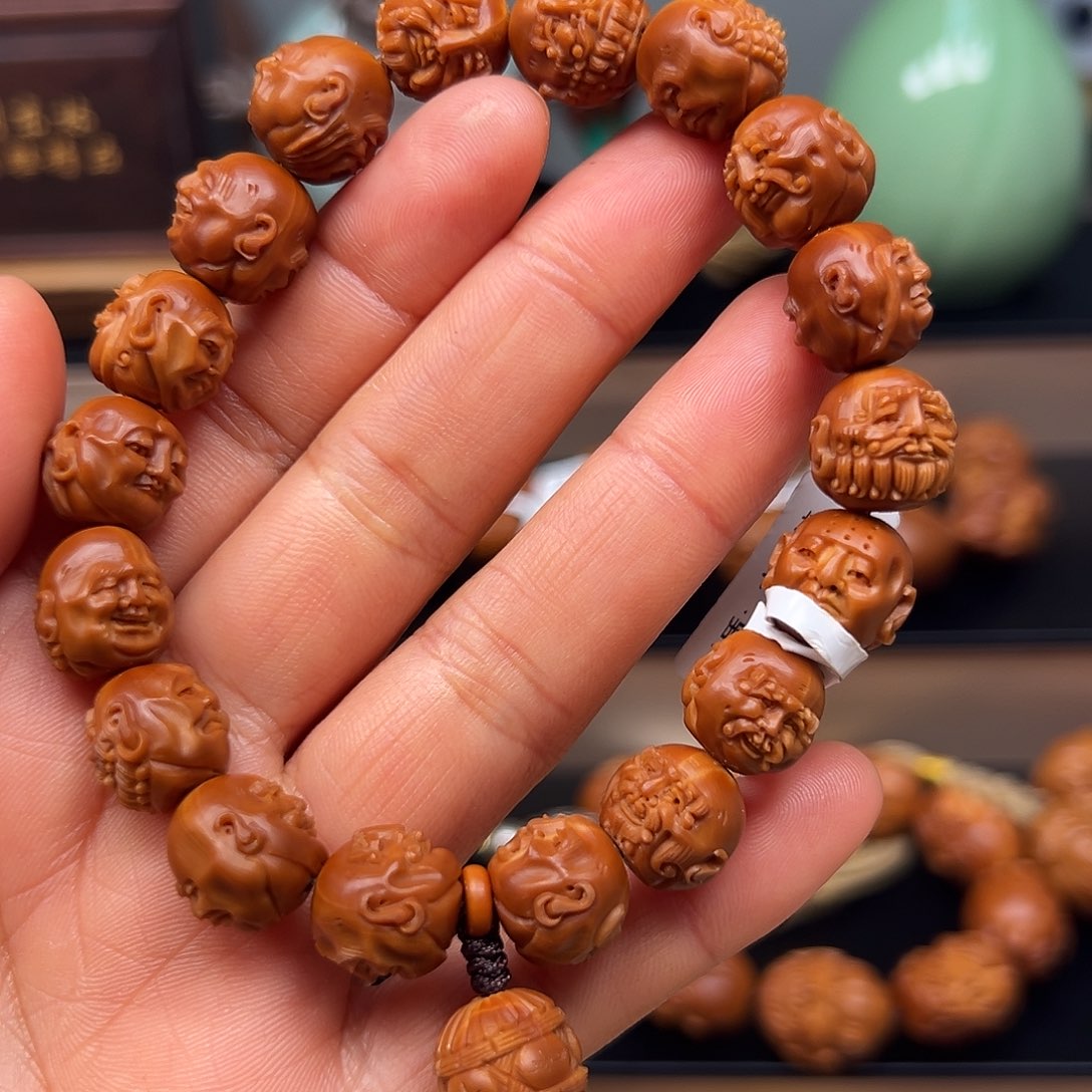 橄榄核吊坠罗汉手串