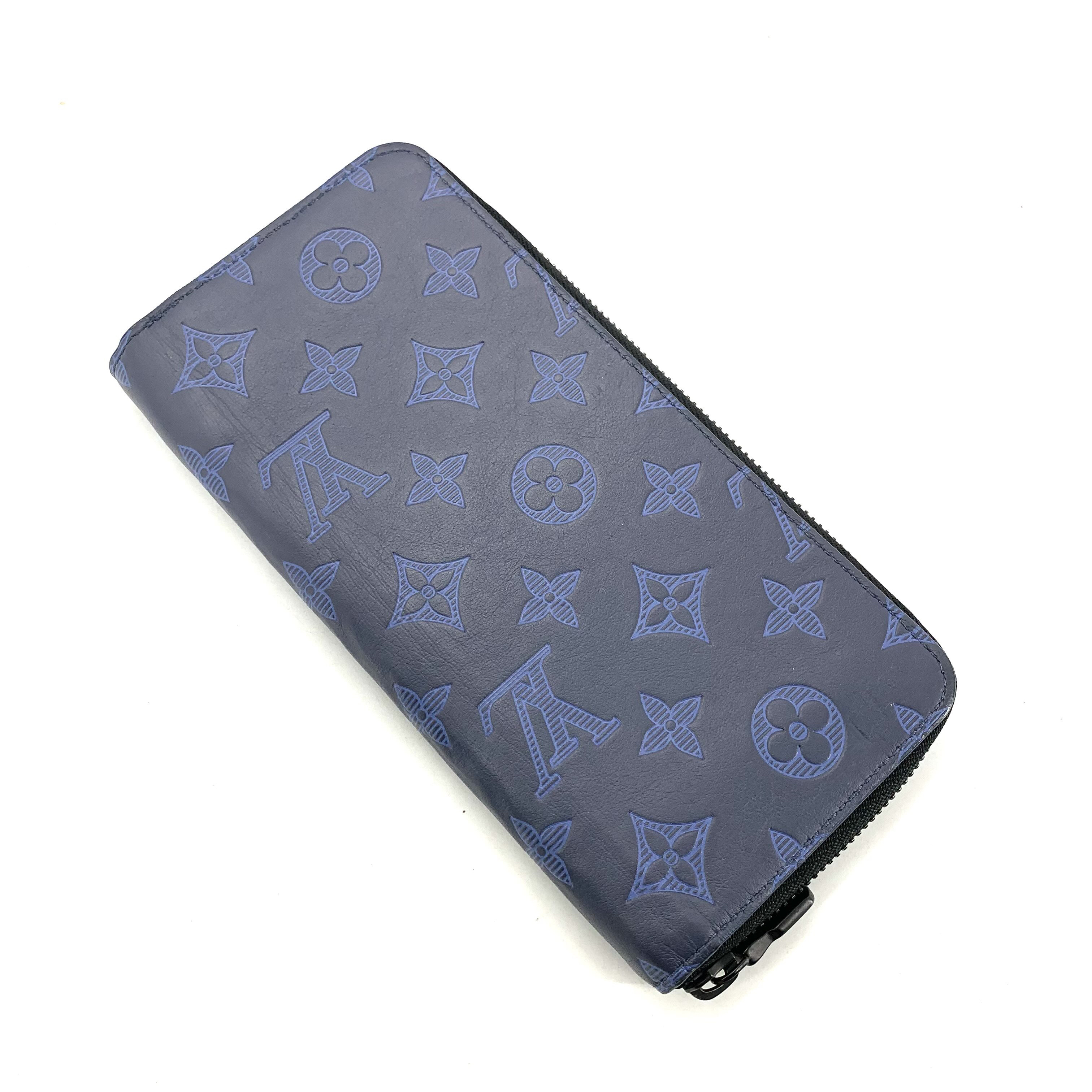 95新 LouisVuitton/路易威登 蓝色全皮压花拉链钱包 尺寸20/10