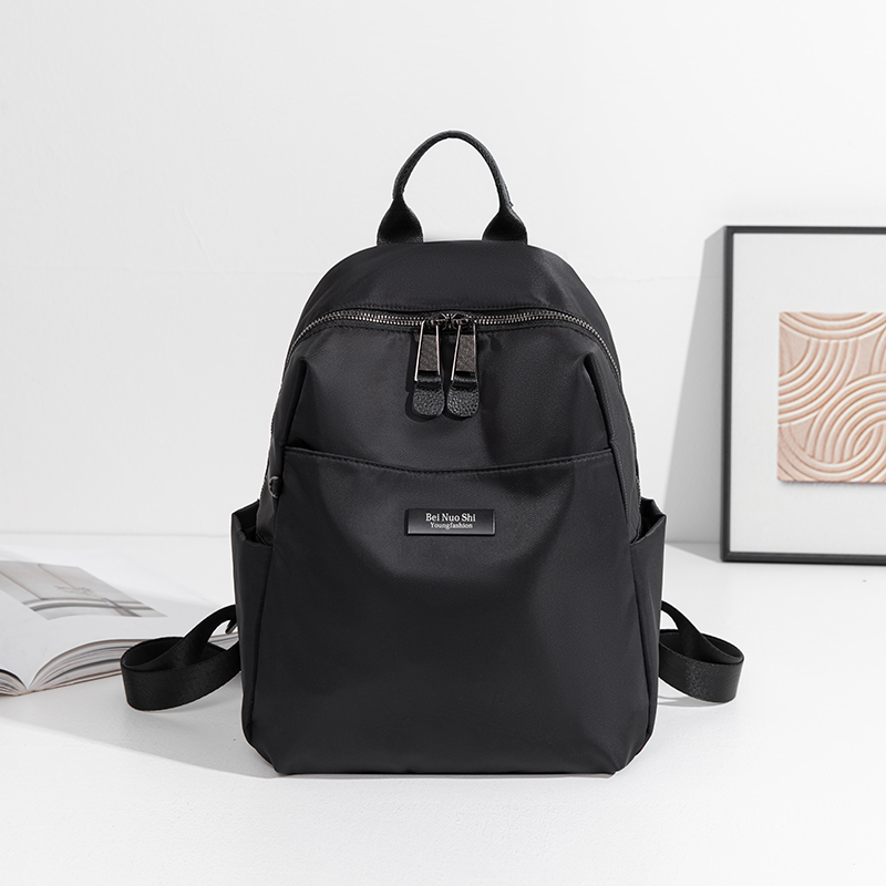 简约时尚双肩包女轻便防水牛津布黑色背包潮流学生书包百搭旅行包