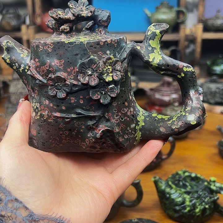 黑**画梅花玉梅桩壶一一