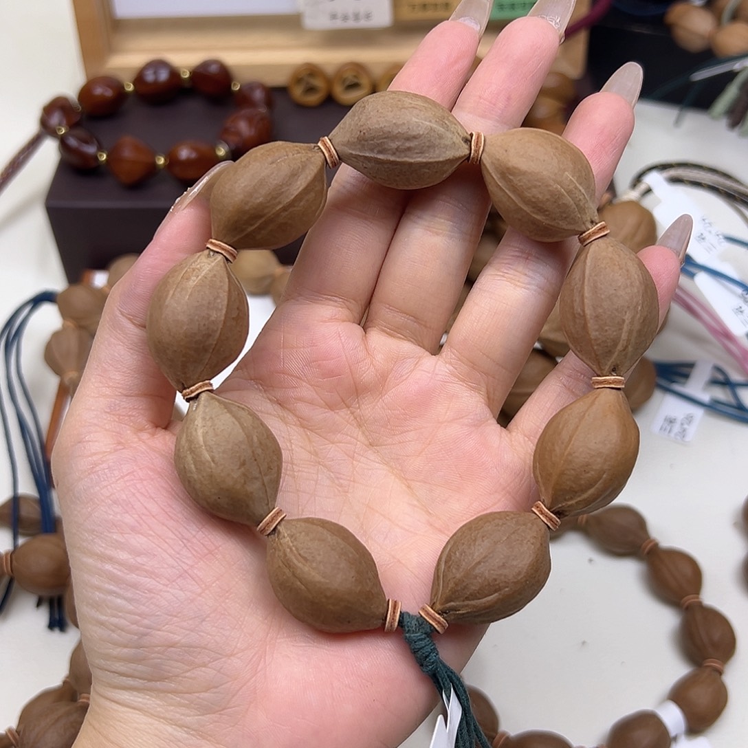 小***嘚橄榄核手串/手链三花19.29