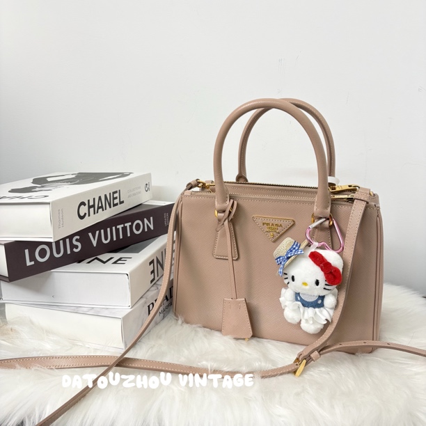 95新 Prada/普拉达 新款裸粉色小号杀手手提斜挎包kl