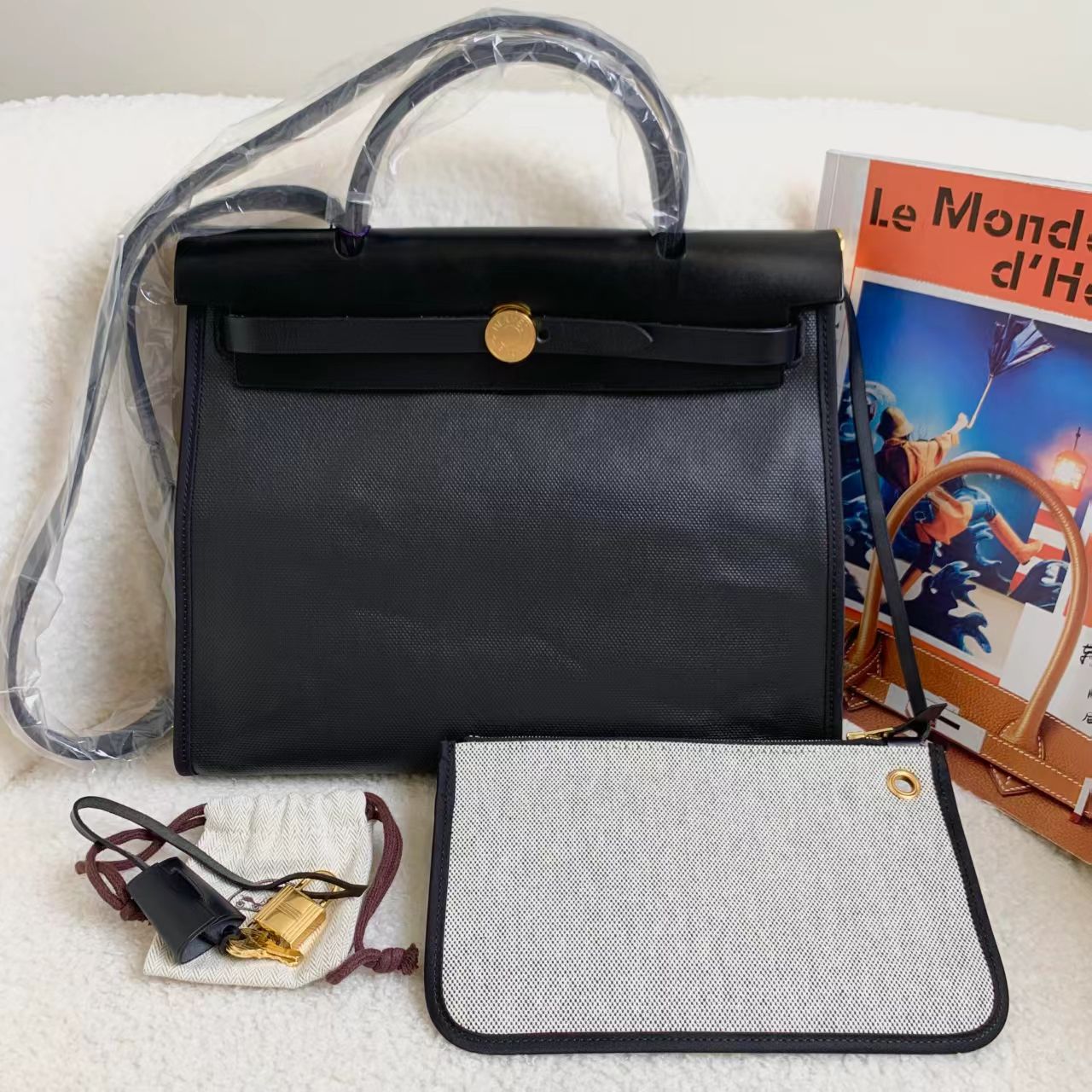99新 Hermes/爱马仕 黑金防水布herbag31 45556447/12期/代卖服务