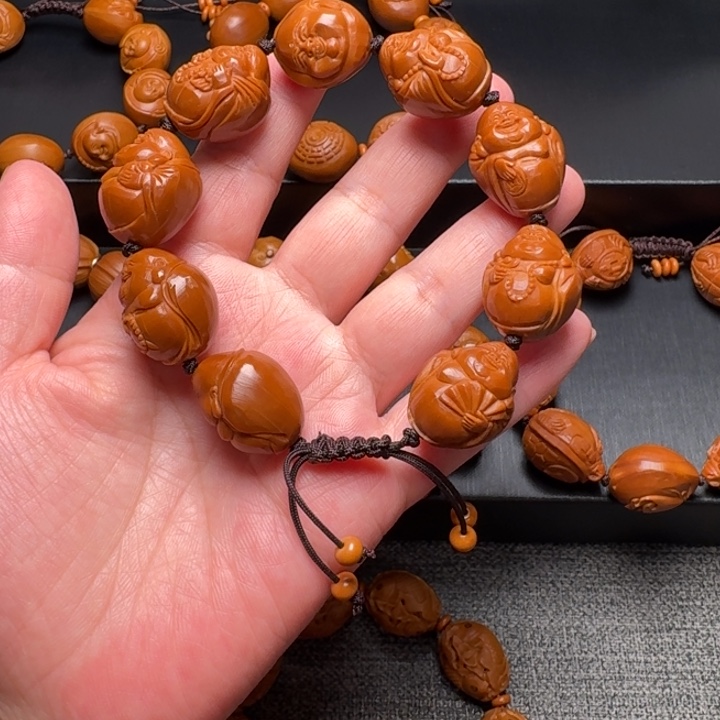 橄榄核手串/手链红料光背弥勒
