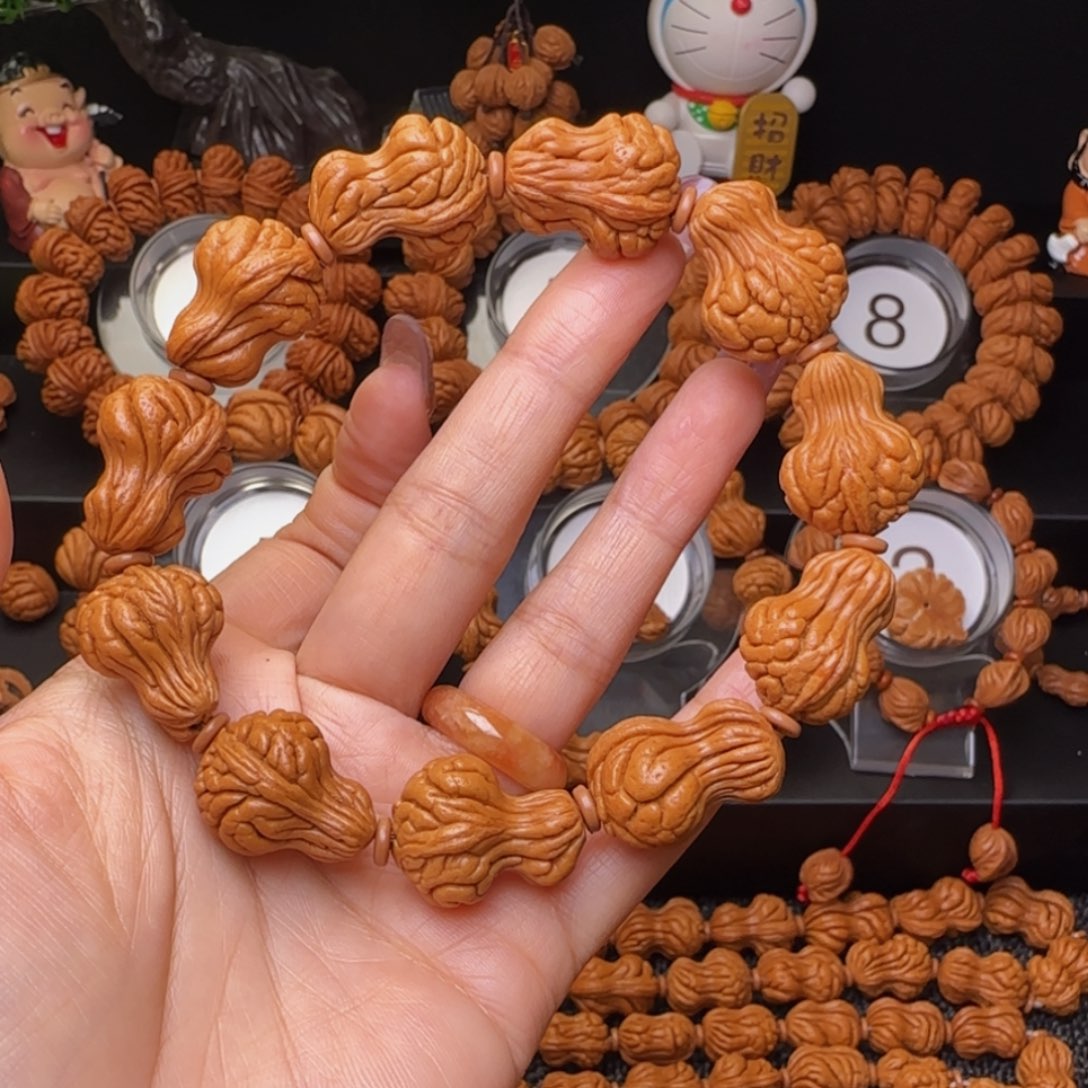 桃核吊坠花生手串
