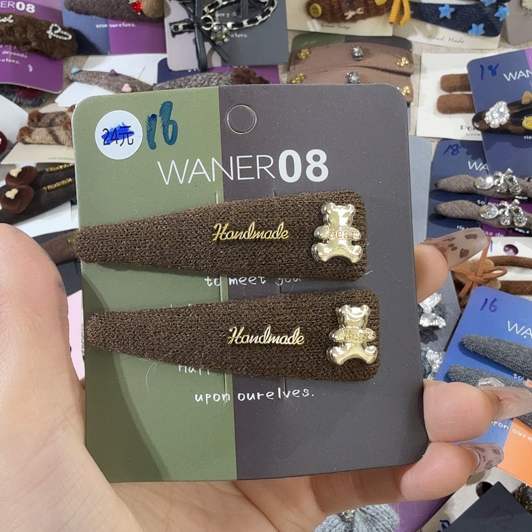 扶***瑶皮质铁合金16夹子1