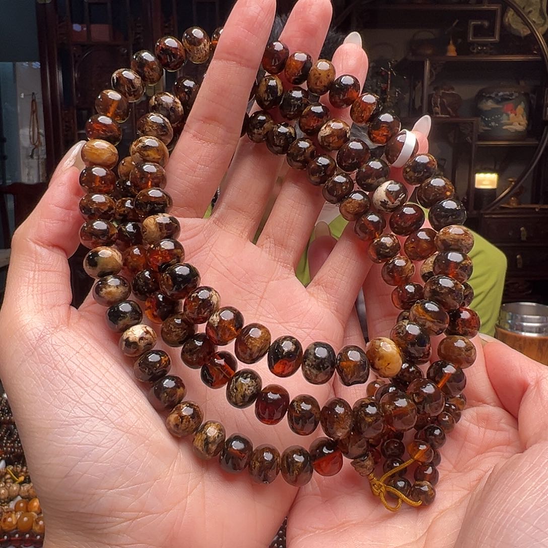 琥珀裸石未镶嵌抚顺琥珀50038。10mm