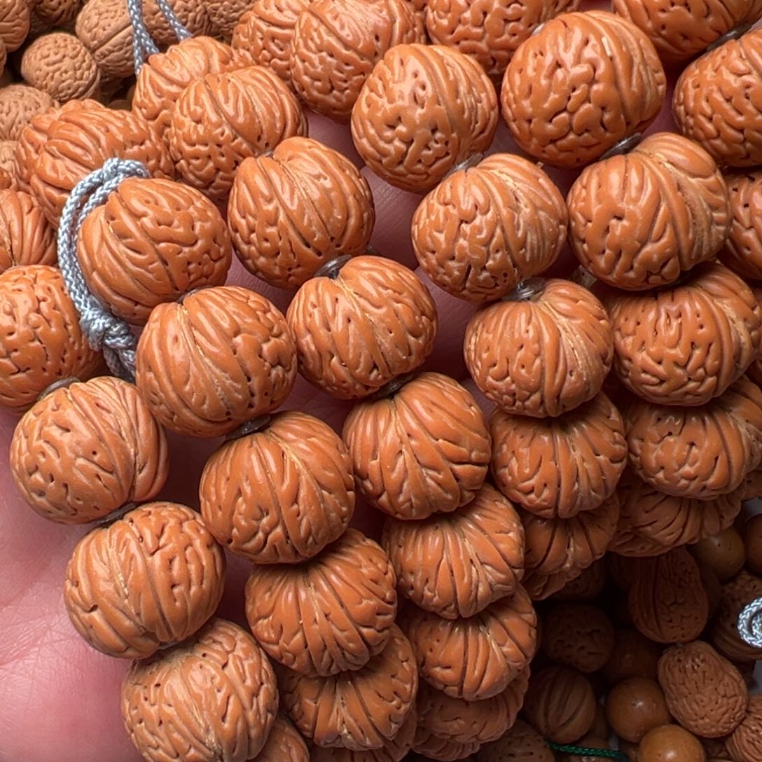 21➕磨盘大开口桃核手串