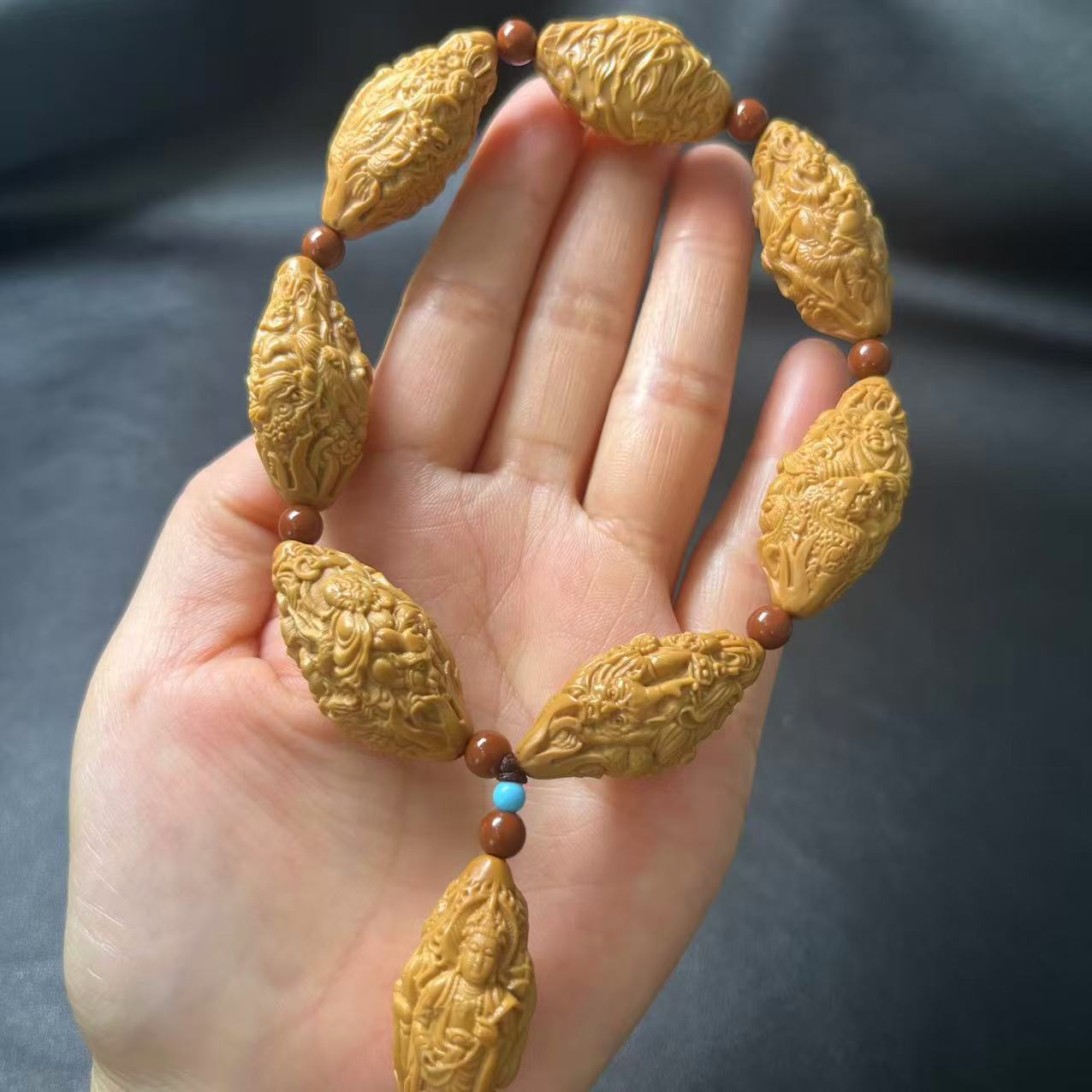 橄榄核三面罗汉手串