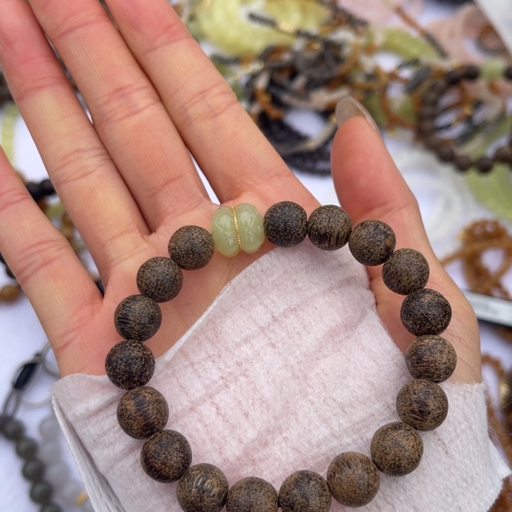 哆***烧和田玉18K金镶嵌手串