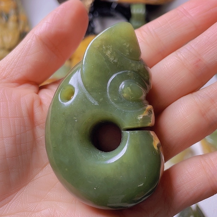 和田玉手把件未镶嵌麒*