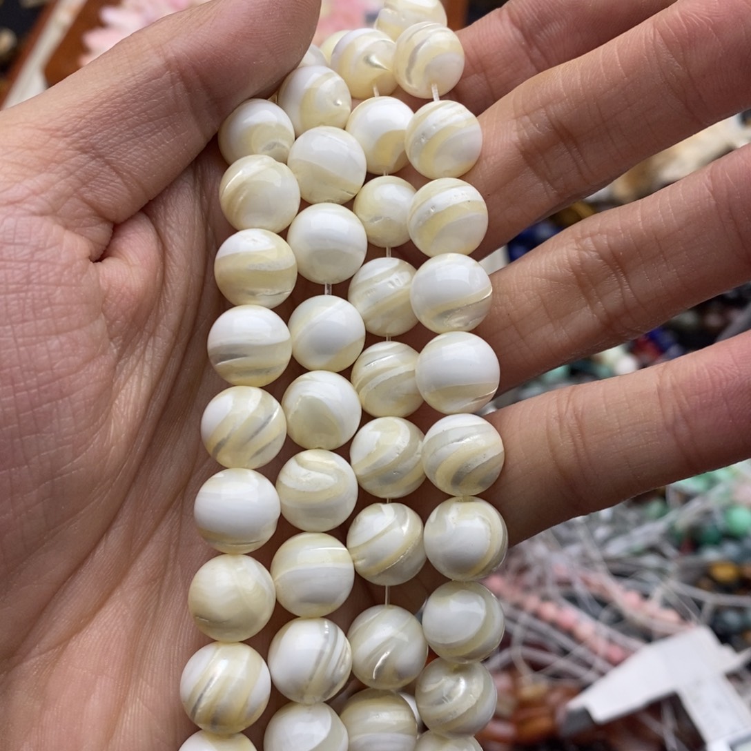玛瑙/玉髓未镶嵌珠宝半成品一条天然10.5mm金马蹄螺圆珠