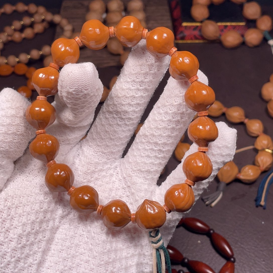 吊坠橄榄核西***人蜜桃臀