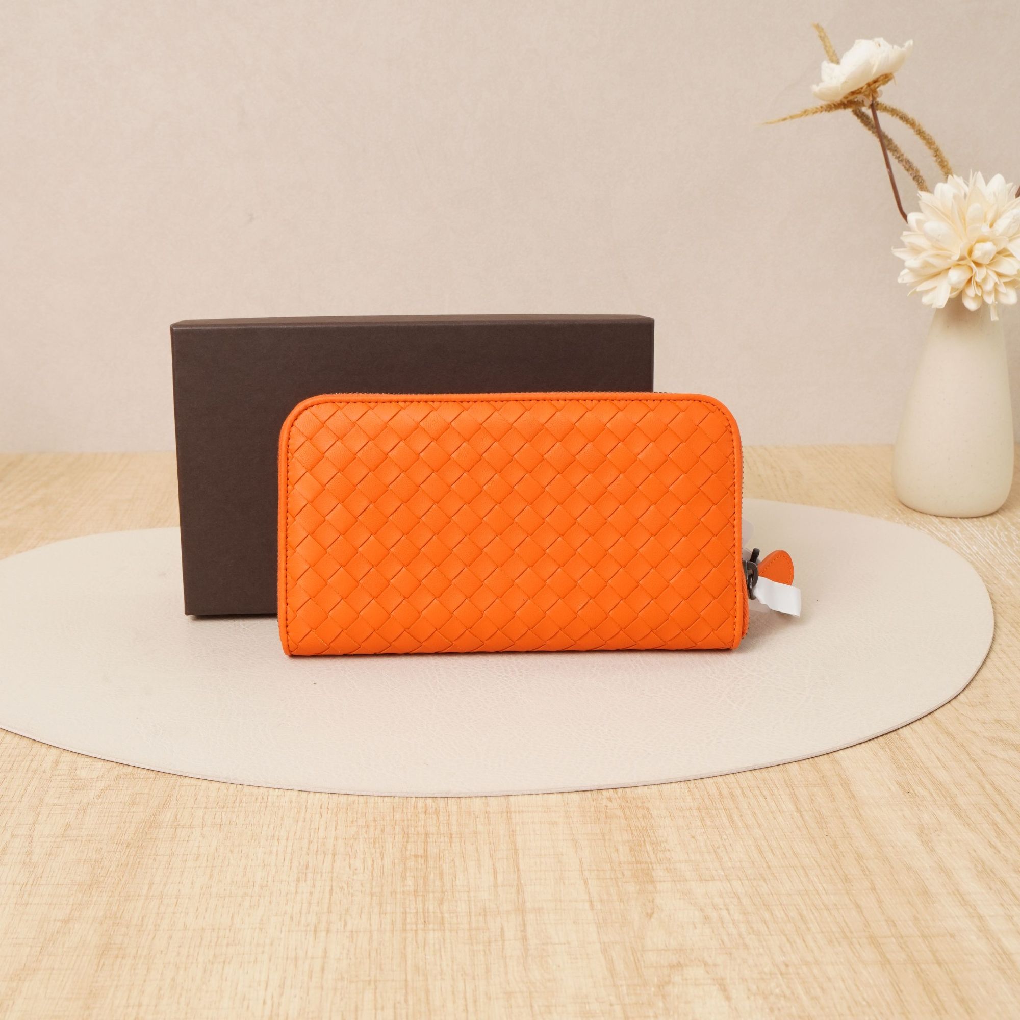 95新 BOTTEGA VENETA/葆蝶家 BV编织拉链长钱包大号橘色/DS033119