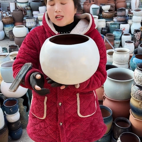 口19高22瑕疵盆子。