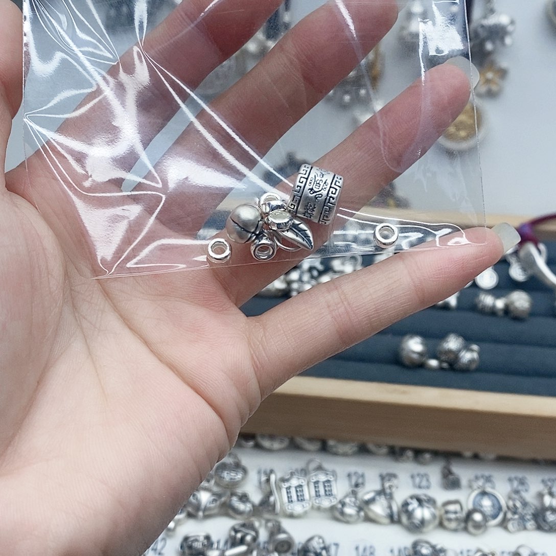 足银锦纶护身符加柿子叶子足银手链