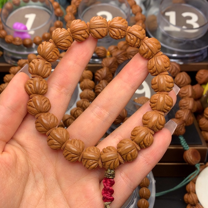 铖***锘桃核吊坠野生红莲13尺寸