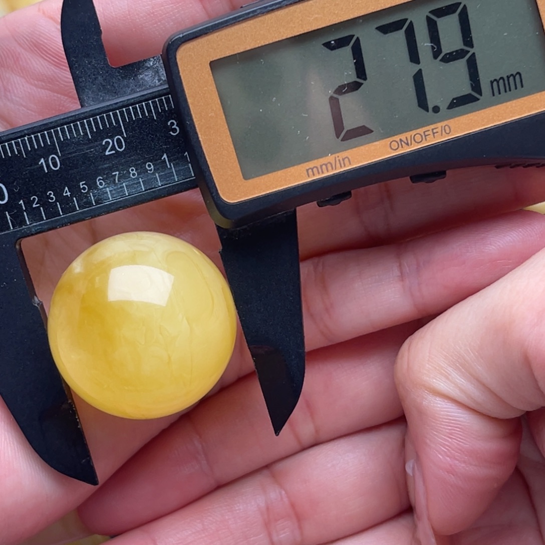 懒***起裸石琥珀未镶嵌蜜蜡圆珠笑