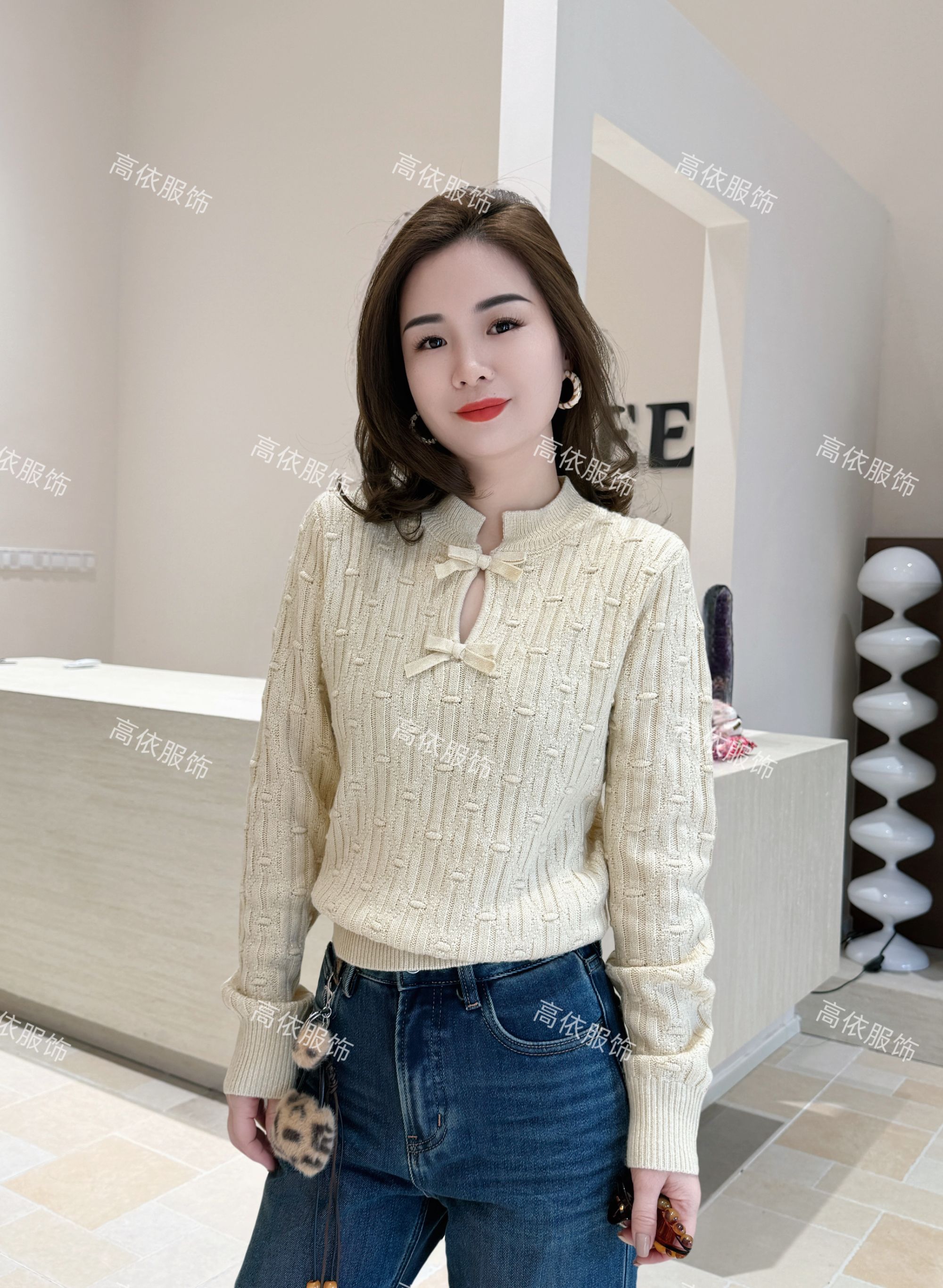 GY90873杏色蝴蝶结毛衣