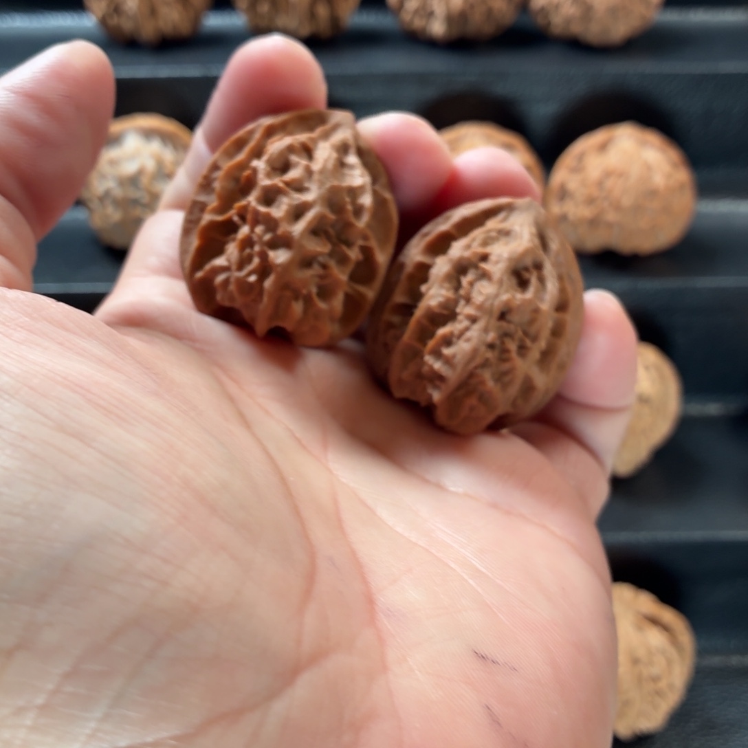 比***邻桃核把件野生原树龙骨鸡心34