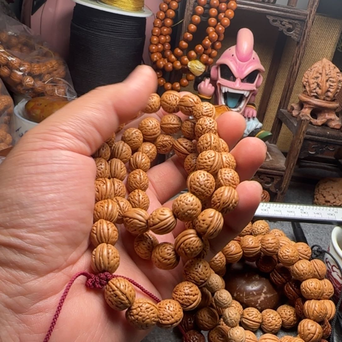 脖挂54颗野生桃核脖挂