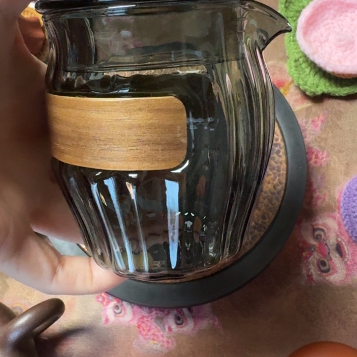 熠羽毛球的手抓壶