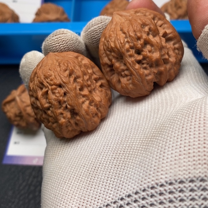 燃***里文玩核桃把件凹底