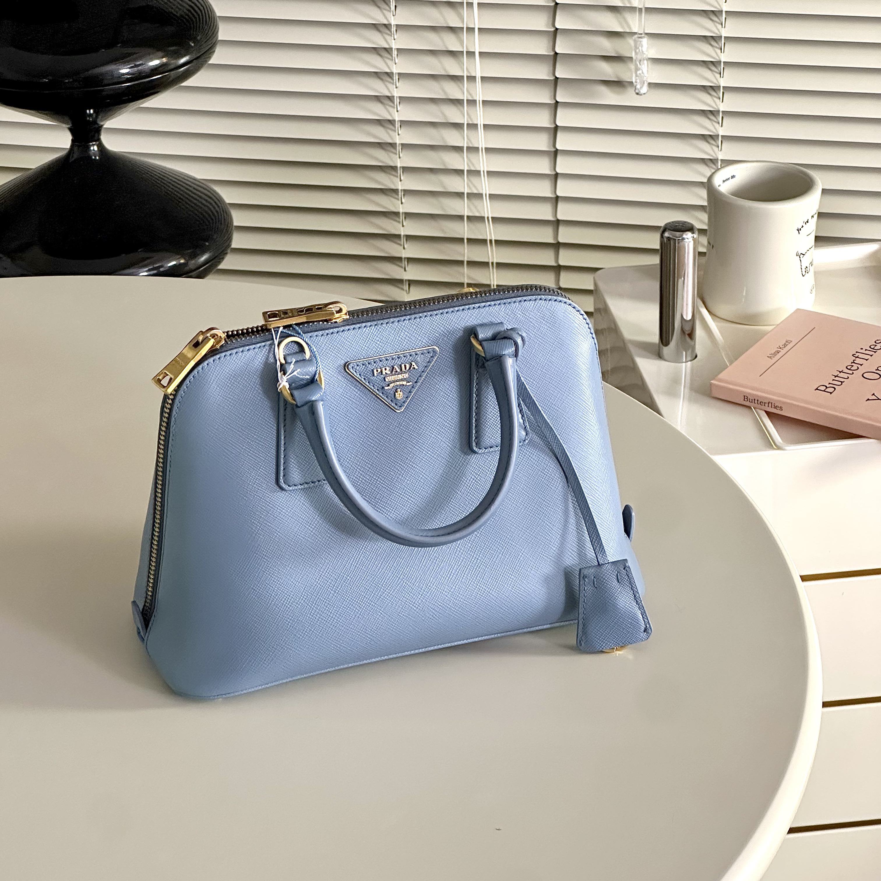 95新 Prada/普拉达 蓝色经典小号贝壳斜挎包