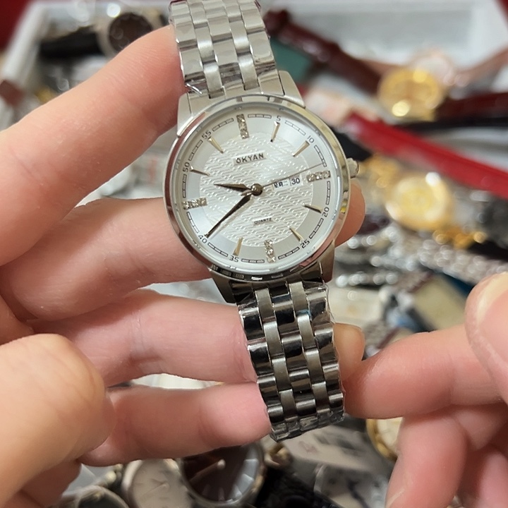 花****钢牛皮（革）钢石英机芯