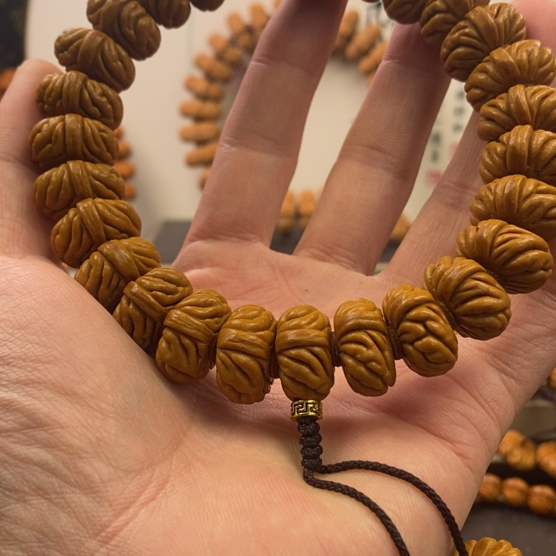 桃核手串小**周19祥云纽扣