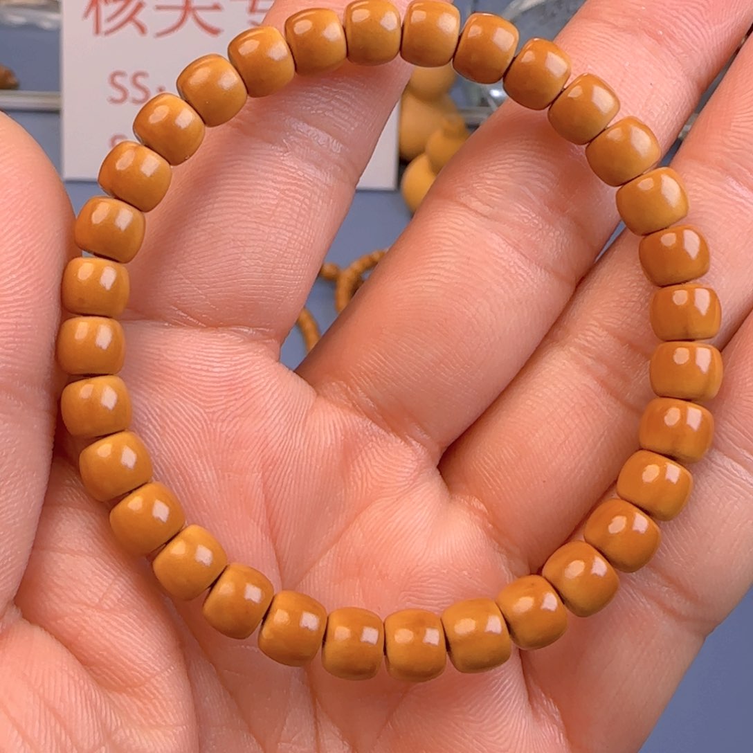 橄榄核手串核尖极限弧尺寸7+ss微变色