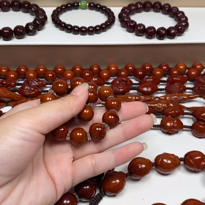 喝***、橄榄核雕刻工艺的发展