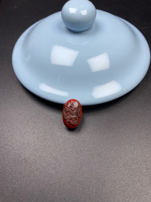 凉山南红包浆仿古龙戒面