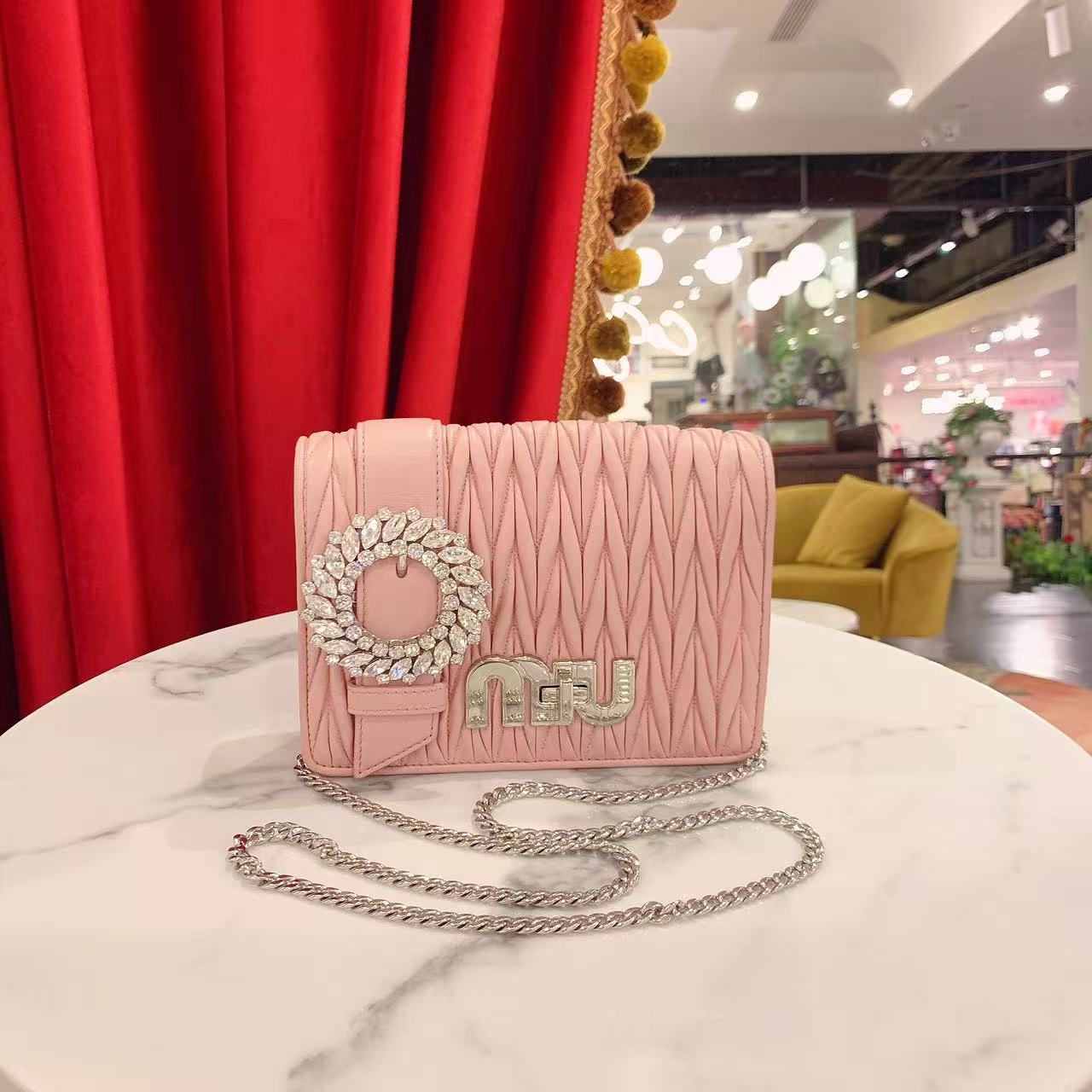 95新 MIU MIU/缪缪 GGS褶皱太阳花粉色银扣羊皮单肩包40296995