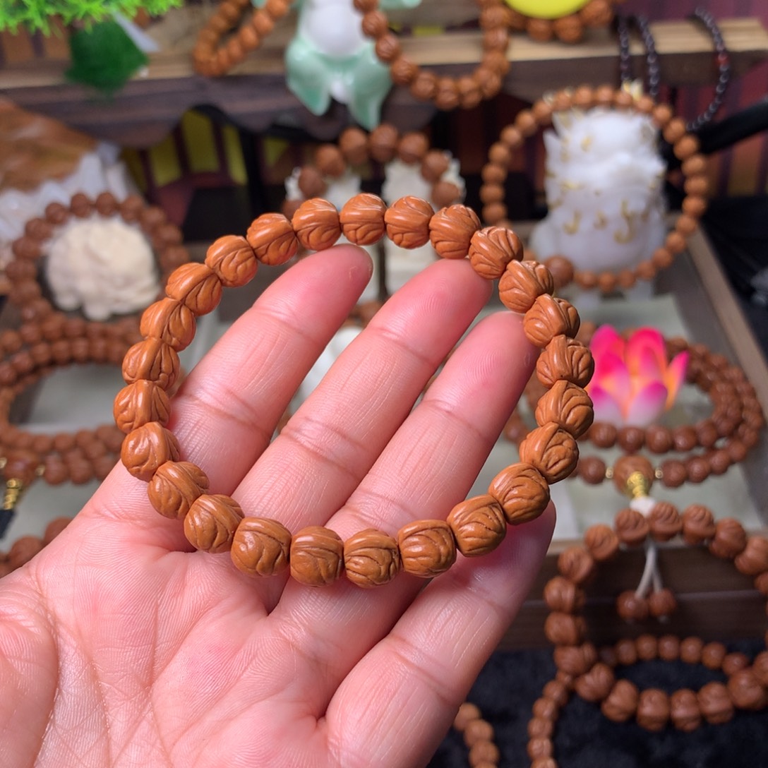 小****桃核吊坠金玉龙手串10