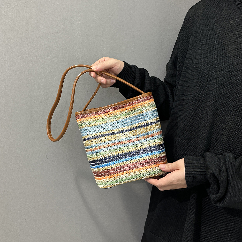 彩虹草编配树膏头层牛皮编织包大容量水桶包个性时尚通勤单肩斜挎