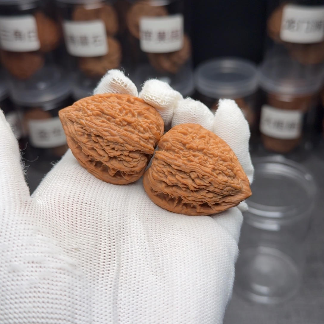 桃***南把件文玩核桃塔尖