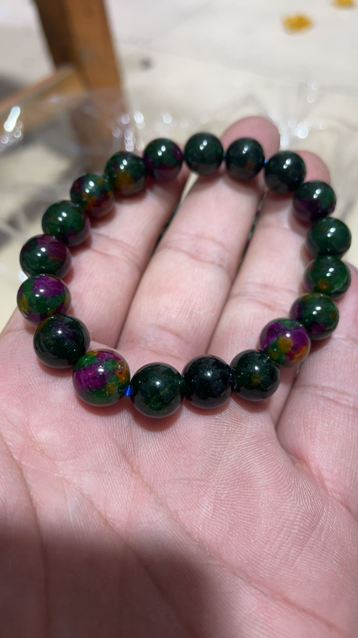 D  974  卡10 孔雀绿花舒手串