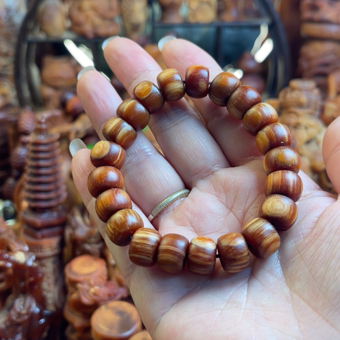 其他松木（琥珀木）微瑕1.2苹果圆手串