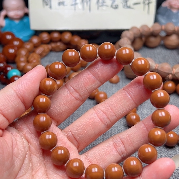 苦***僧橄榄核手串1.1全品超小孔