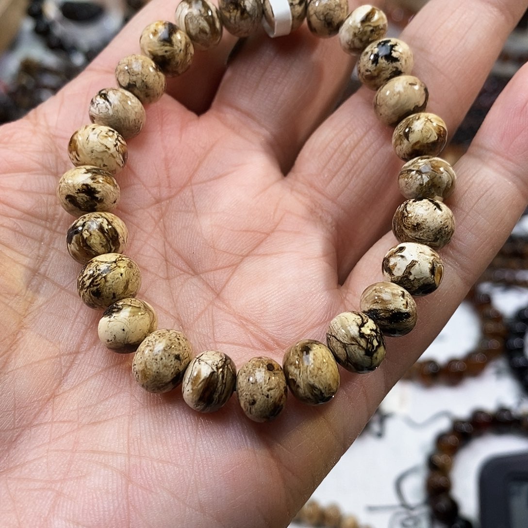 孙***芳琥珀未镶嵌手链9干白