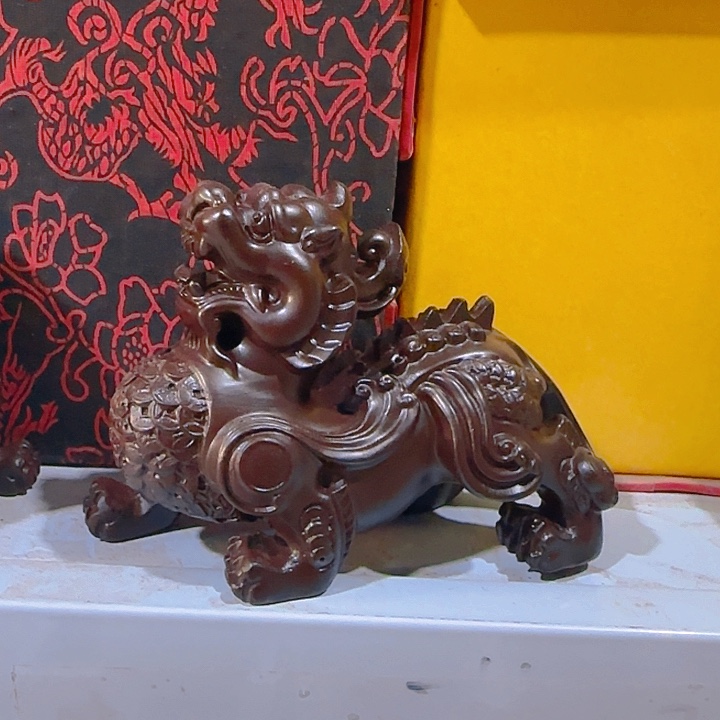 木黑檀木12金钱貔貅一只