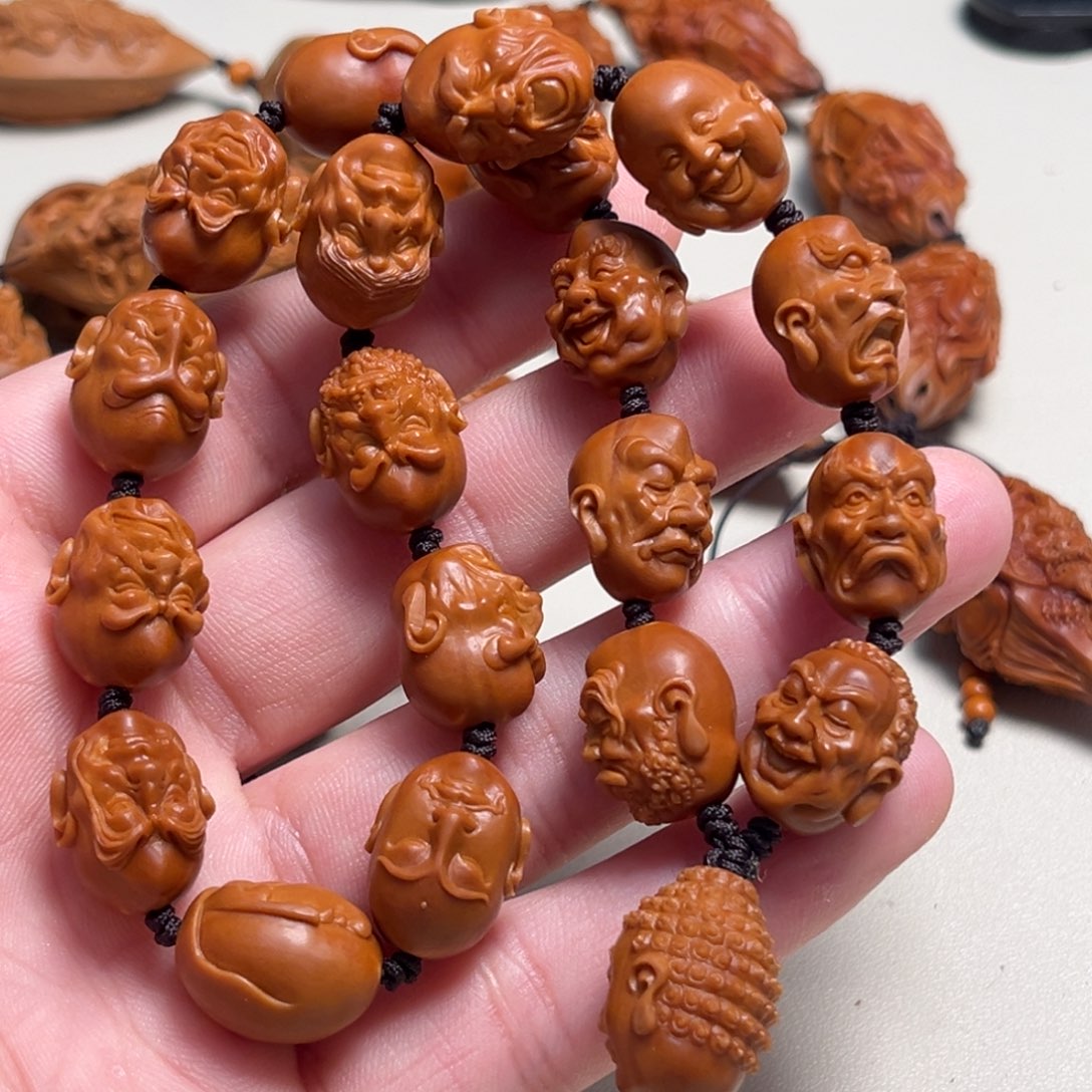 橄榄核吊坠别***谁十八罗汉