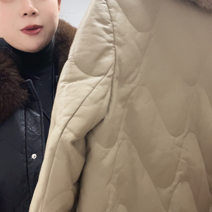 皮衣皮衣哦哟拍皮衣