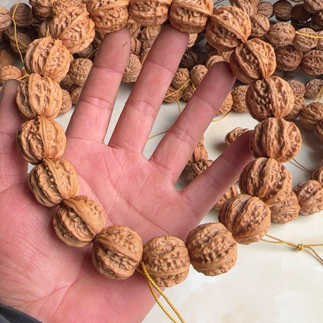 聚***林文玩核桃吊坠八棱小核桃