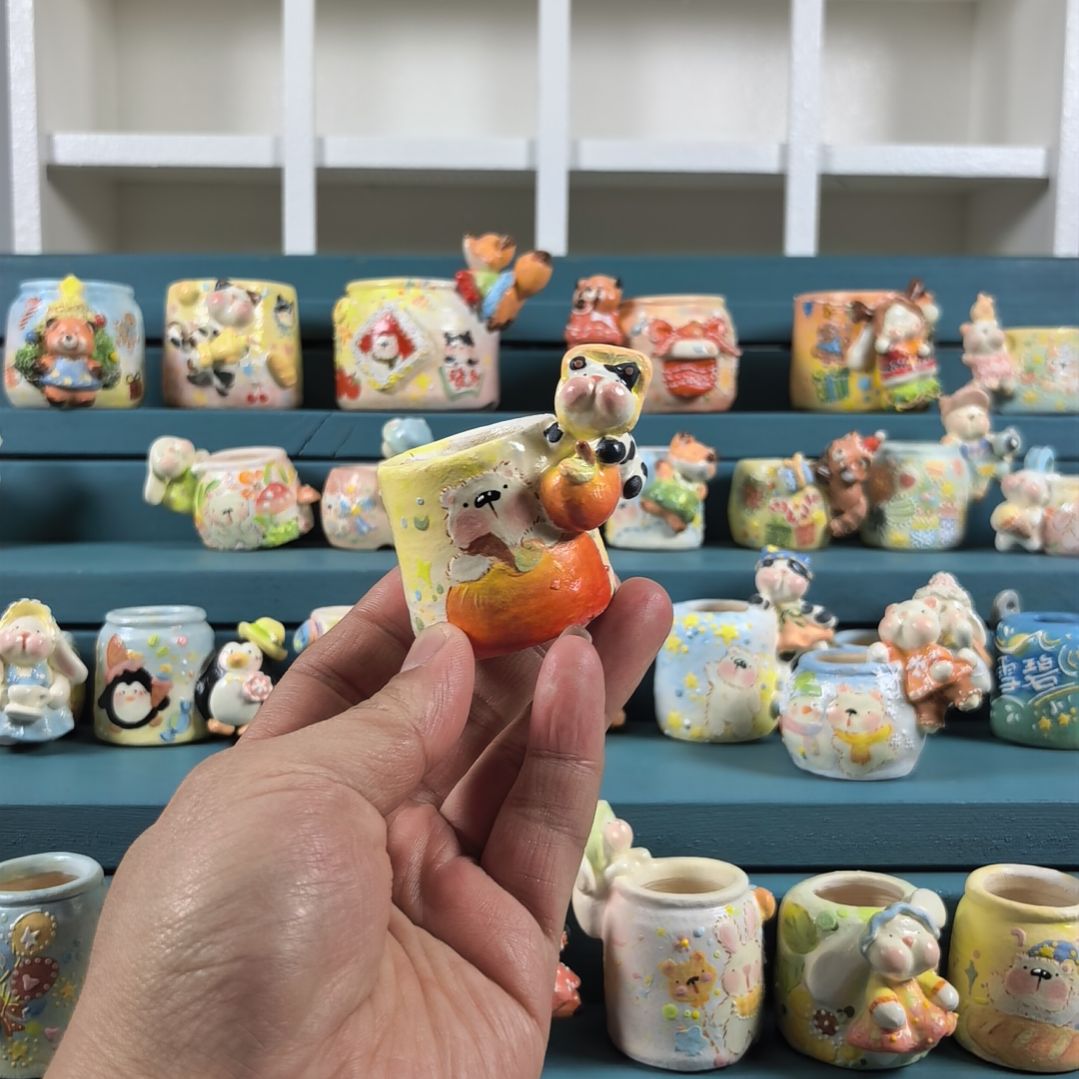 橙***ᐝ苹果奶牛猫 手绘多肉花盆