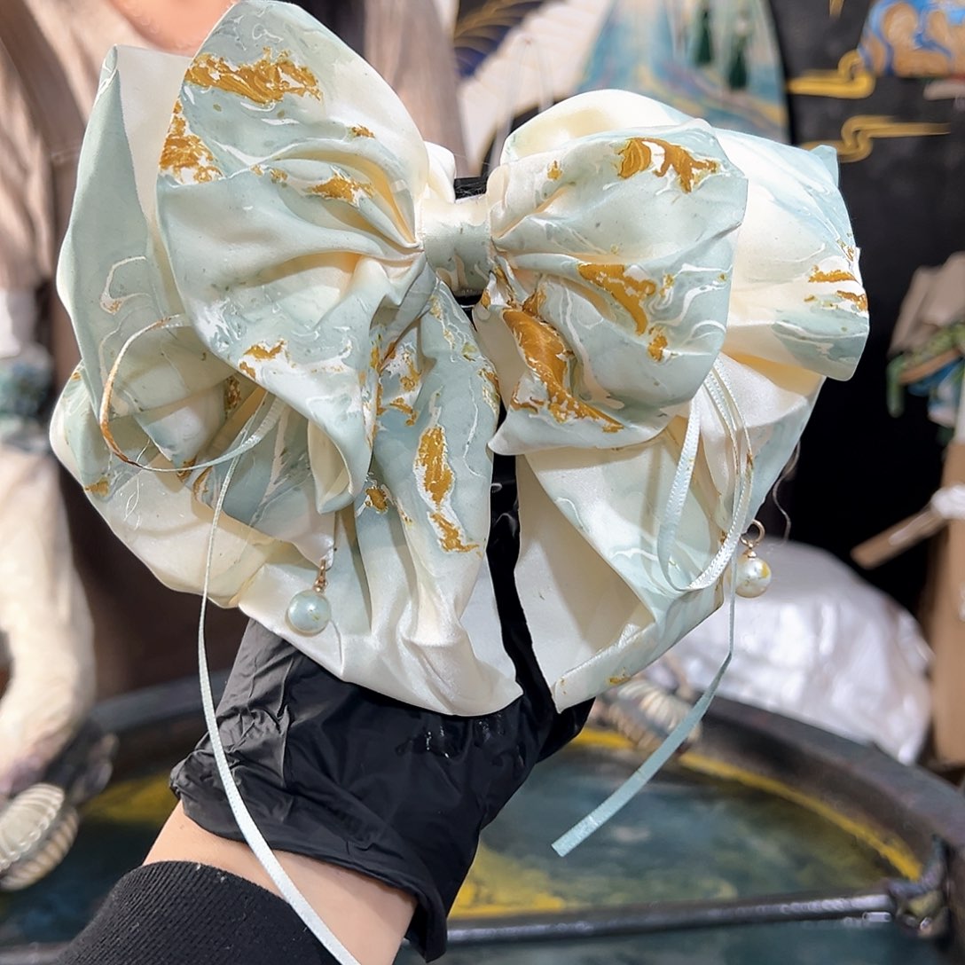 737蝴蝶抓夹浅蓝金