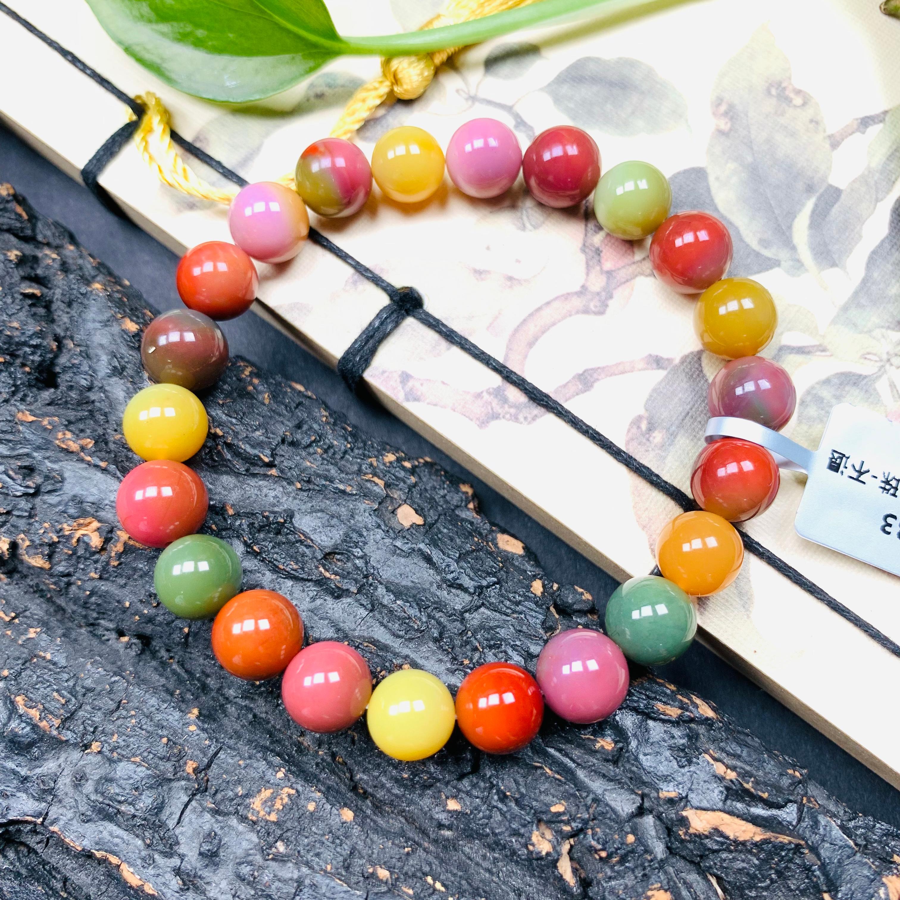 天然老矿七彩盐源玛瑙糖果俏色8.6mm上下圆珠手串
