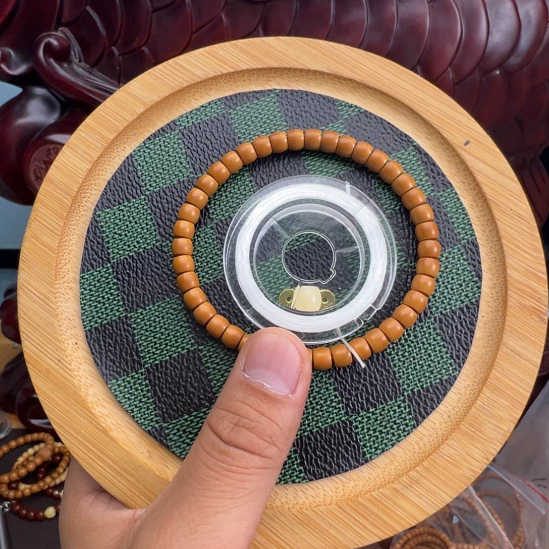 橄榄核吊坠0.6核尖手串